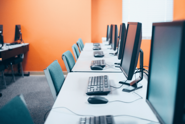 row-of-keyboards-and-monitors